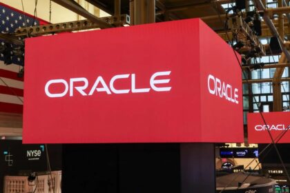 Several screens projecting the Oracle name with a red background and black letters