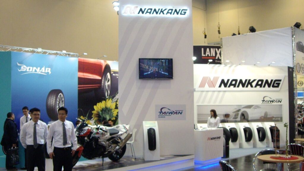 A company showcasing its products at a booth in the middle of an event