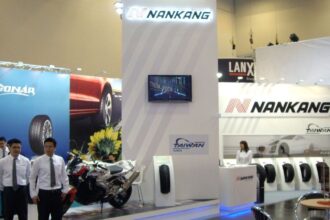A company showcasing its products at a booth in the middle of an event