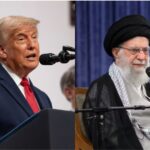 The two top officials from both countries seated at a podium, preparing to speak into microphones