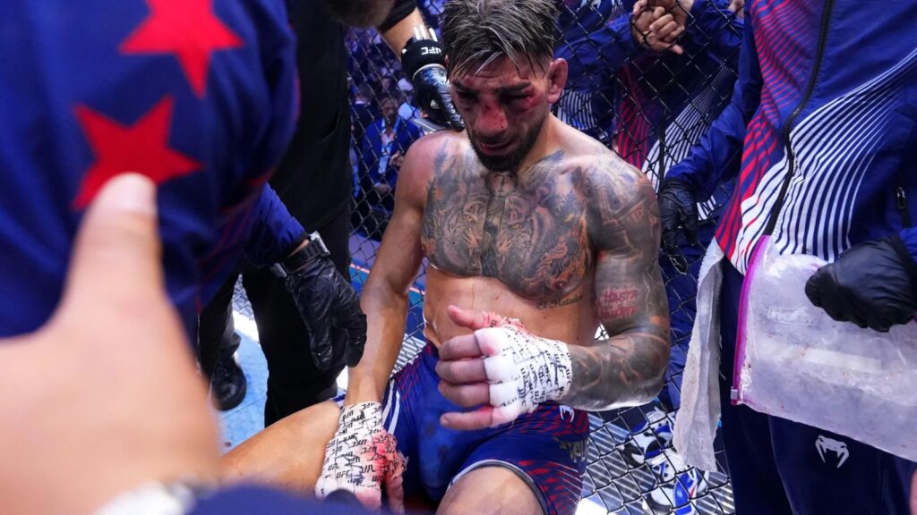 The UFC fighter sitting inside the octagon with multiple injuries after his defeat is announced