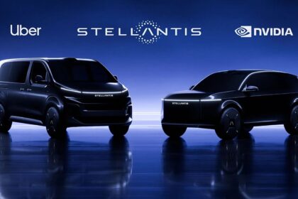 Two black high-tech cars being showcased as the next generation of smart Uber vehicles