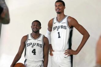 The American point guard and the French phenom posing for a photo session