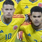 The two Colombian stars hugging each other for the team photo before the start of a match