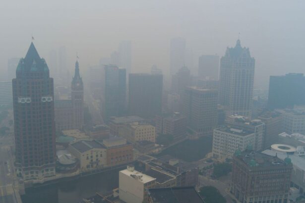 A panoramic view of New York where buildings and houses are shrouded in a thick cloud of pollution and smoke