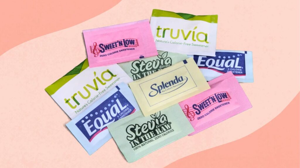 Several packets of artificial sweeteners neatly arranged for a photo shoot