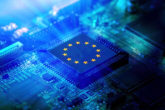 A small chip mounted on a motherboard featuring the flag of the European Union