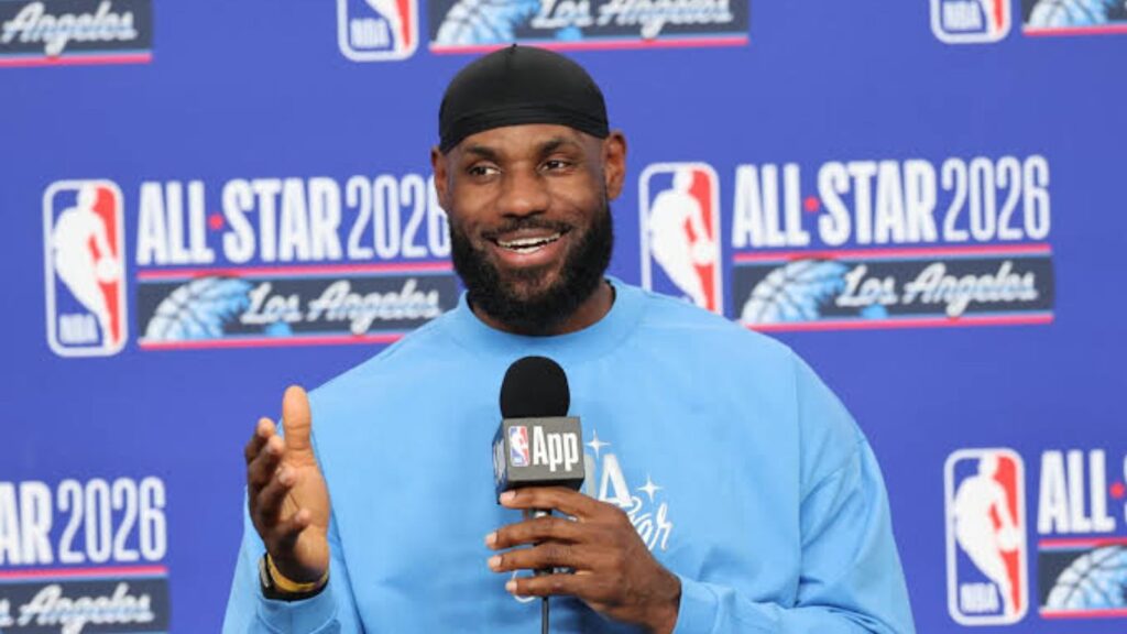 The now-free agent sitting at a press conference, looking very happy and smiling.