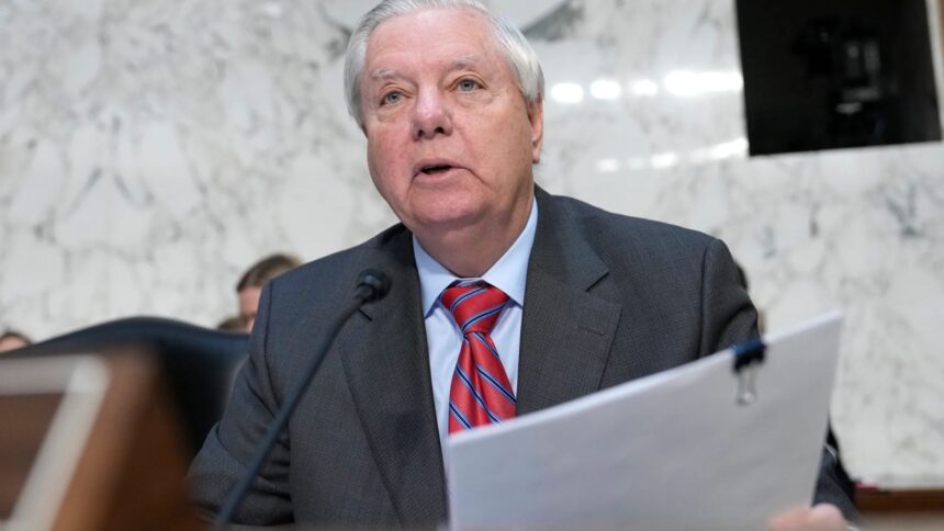The prominent and well-known U.S. senator standing in the Senate, speaking into a microphone as his colleagues look on