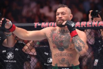 Conor McGregor warming up and throwing punches in the air before his fight against Max Holloway
