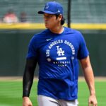 The Japanese superstar walking on the field wearing the Dodgers' practice uniform