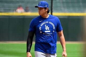 The Japanese superstar walking on the field wearing the Dodgers' practice uniform