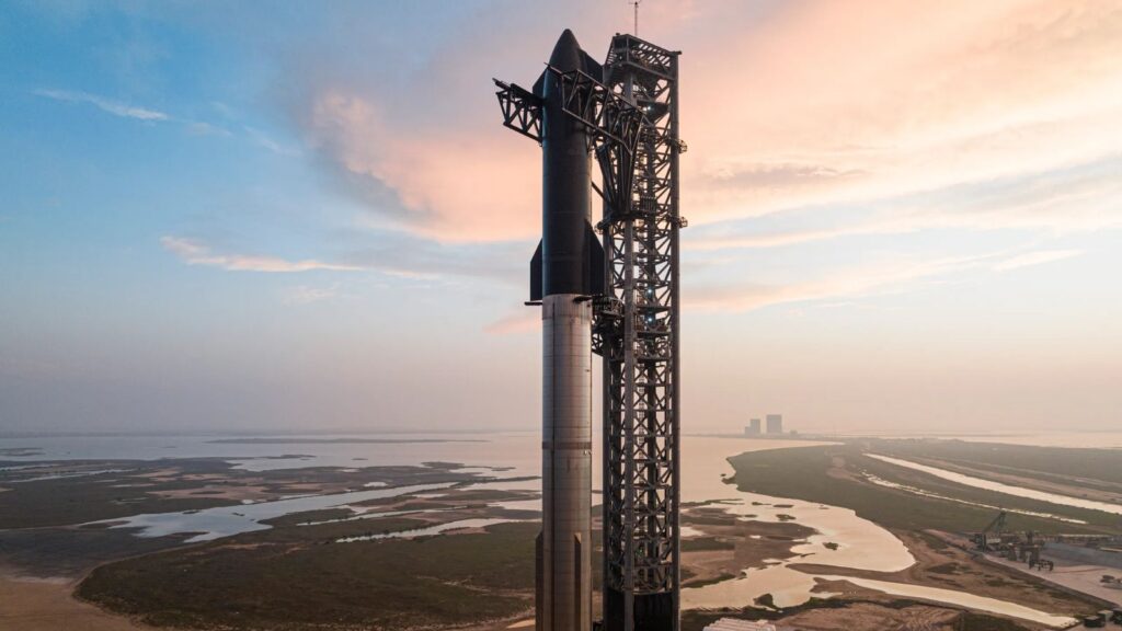 A SpaceX rocket in launch position, awaiting the command for liftoff