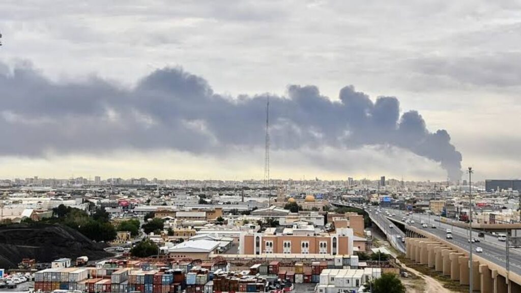 A Kuwaiti city engulfed in smoke in the aftermath of a missile attack