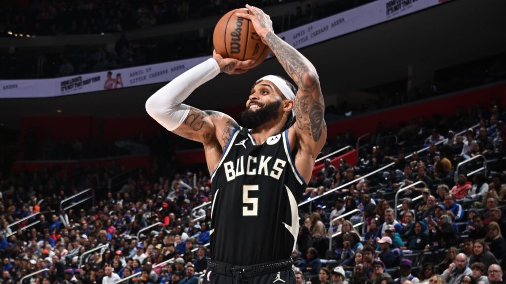 "The veteran NBA shooter preparing to sink a long-range three-pointer