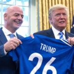 Infantino presenting Trump with a jersey bearing his name at the White House