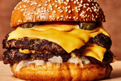 A delicious burger with double meat, sauce, and melted cheese