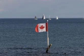 The great Lake Ontario with several small boats sailing across it