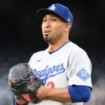 Dodgers lose Edwin “Sugar” Díaz again after new injury Díaz looking concerned while holding his glove during a game