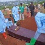 Ebola outbreak in Congo reaches one of its deadliest weeks yet Several doctors burying multiple Ebola victims in a large field spanning many acres