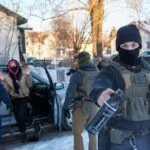 Several ICE officers conducting raids during the winter