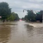 One of Indiana’s streets completely flooded, with the roads filled with water and impassable