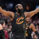 Harden celebrating with his arms wide open after hitting a game-winning shot