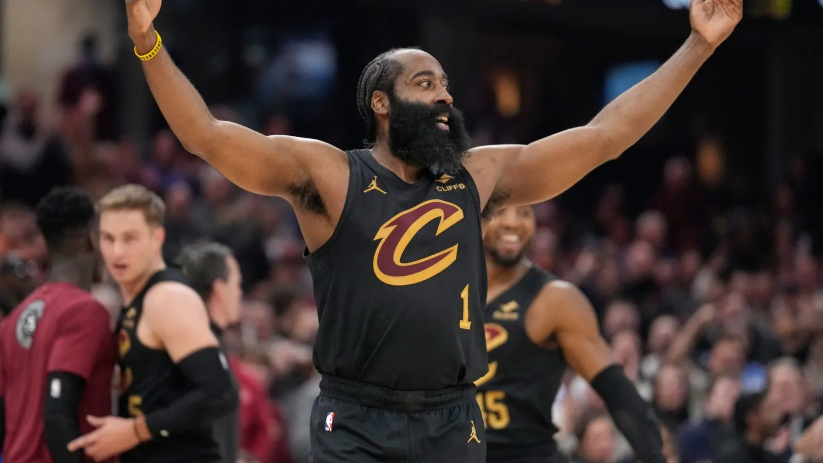 Harden celebrating with his arms wide open after hitting a game-winning shot