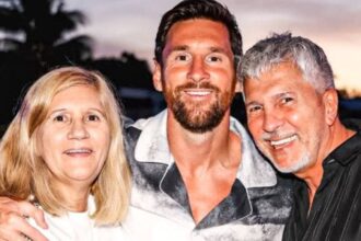 A photo of Messi with his mother and father sharing a warm embrace