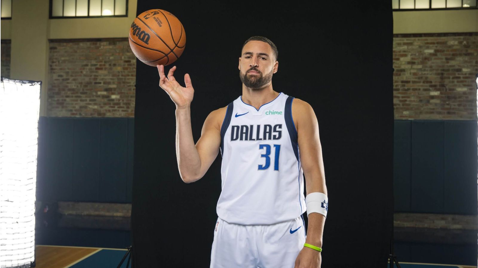 The veteran NBA shooter playing around with the ball while being photographed