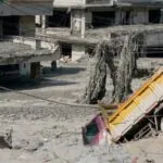 A Nepalese village completely submerged in mud, causing extensive damage to infrastructure