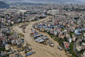 Nepal faces tragedy as flash floods leave dozens dead and hundreds missing A city in Nepal with an overflowing river running completely through the city