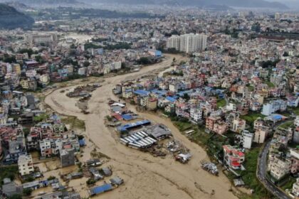 Nepal faces tragedy as flash floods leave dozens dead and hundreds missing A city in Nepal with an overflowing river running completely through the city