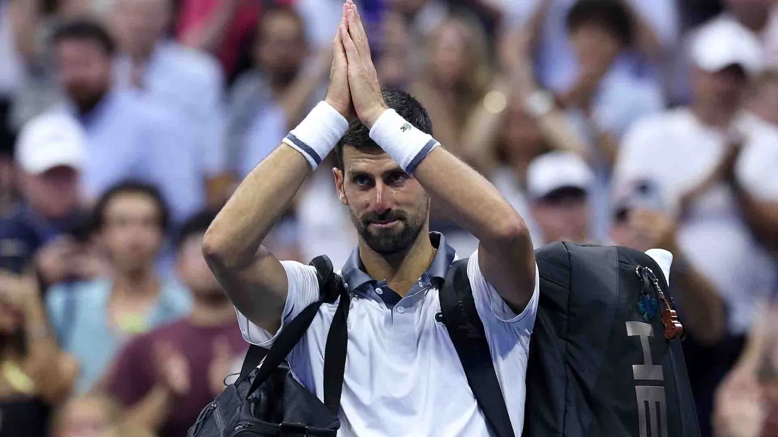 Novak Djokovic eliminated from US Open after five set battle against Mariano Navone Novak clasping his hands in a gesture of respect and apology as he leaves the court