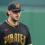 The incredible pitcher with a worried look on his face while standing on the mound
