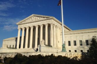 Supreme Court gives Donald Trump a legal victory over mail-in voting restrictions A panoramic photo of the U.S. Supreme Court showcasing its beautiful architecture