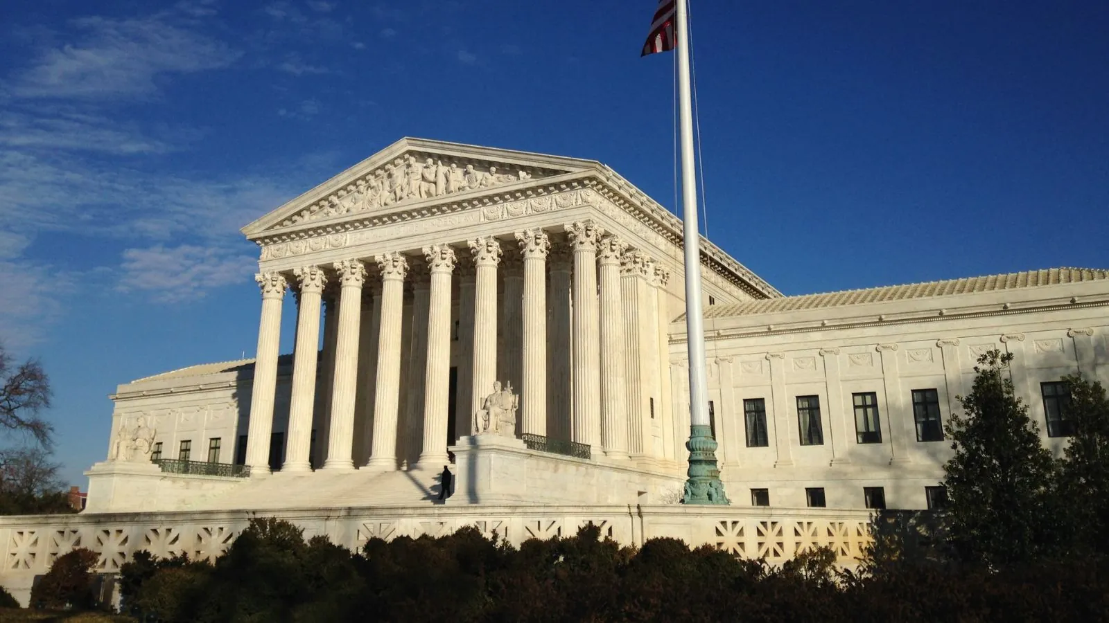 Supreme Court gives Donald Trump a legal victory over mail-in voting restrictions A panoramic photo of the U.S. Supreme Court showcasing its beautiful architecture