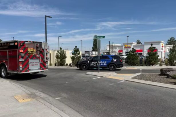 A fire truck and several police vehicles surrounding the restaurant where the shooting occurred