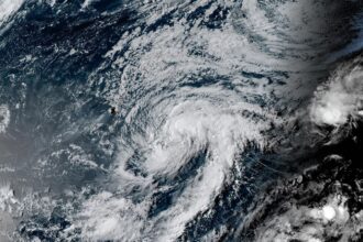 A satellite view of the powerful storm moving along the coast of Hawaii