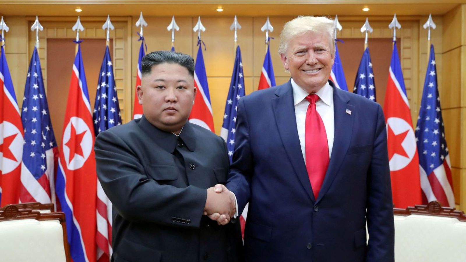 Senior officials from both countries shaking hands as a gesture of goodwill