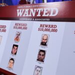 A wanted poster displayed at the White House in the United States, showcasing the multi-million-dollar rewards offered for the fugitives