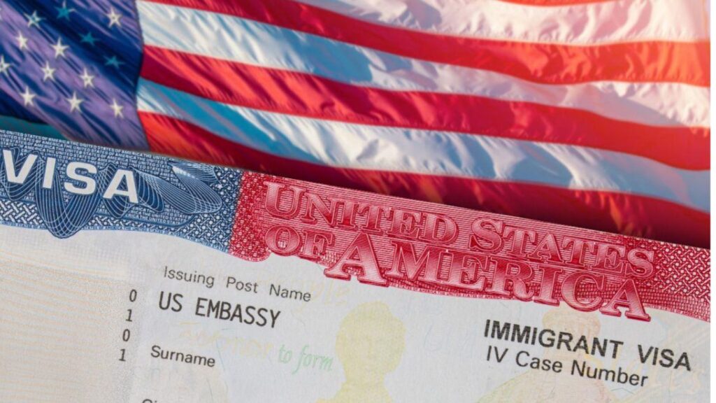 A United States visa placed on top of an American flag