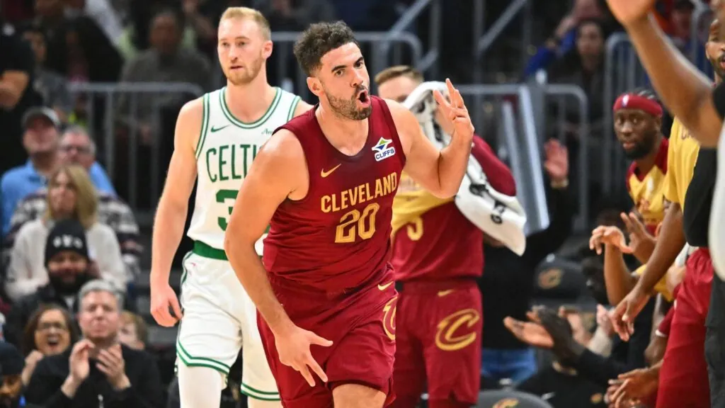 the veteran player celebrating euphorically after hitting a three-pointer