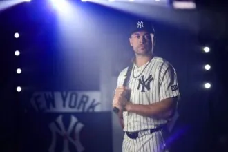 Yankees move Giancarlo Stanton to 60-day injured list after another setback Stanton posing with his bat for a promotional photo shoot with his team