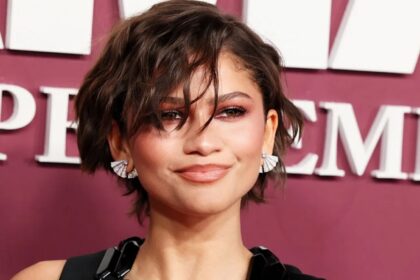 The acclaimed actress posing on the red carpet at a movie premiere
