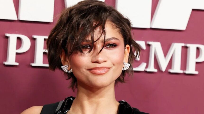 The acclaimed actress posing on the red carpet at a movie premiere