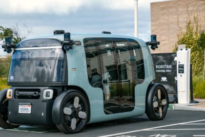A high-tech taxi parked while charging its battery