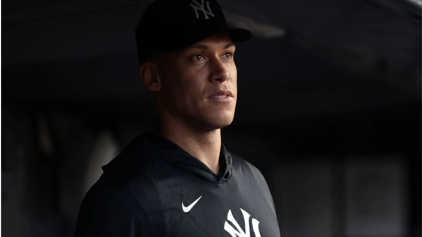 Aaron Judge could miss MLB wild card series after calf injury Judge, dressed in formal attire, watching his teammates play