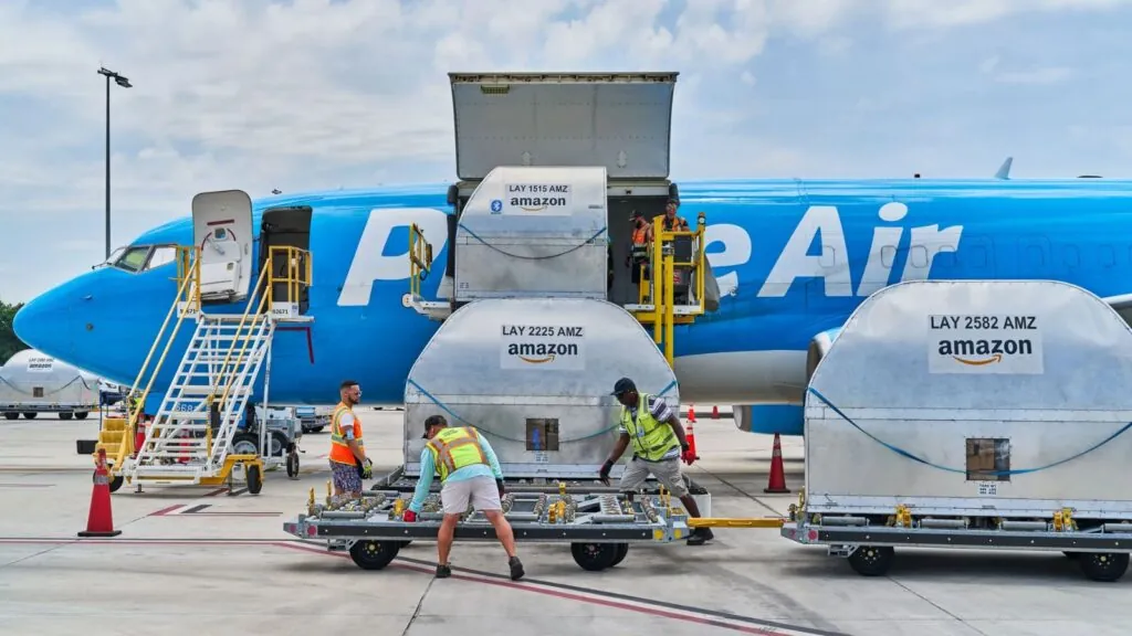 Amazon suspends 21 air operations after deadly Miami plane crash A large Amazon plane being loaded with products to be shipped to other countries and cities