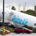 The white Amazon plane crashed into the ground following the Miami accident